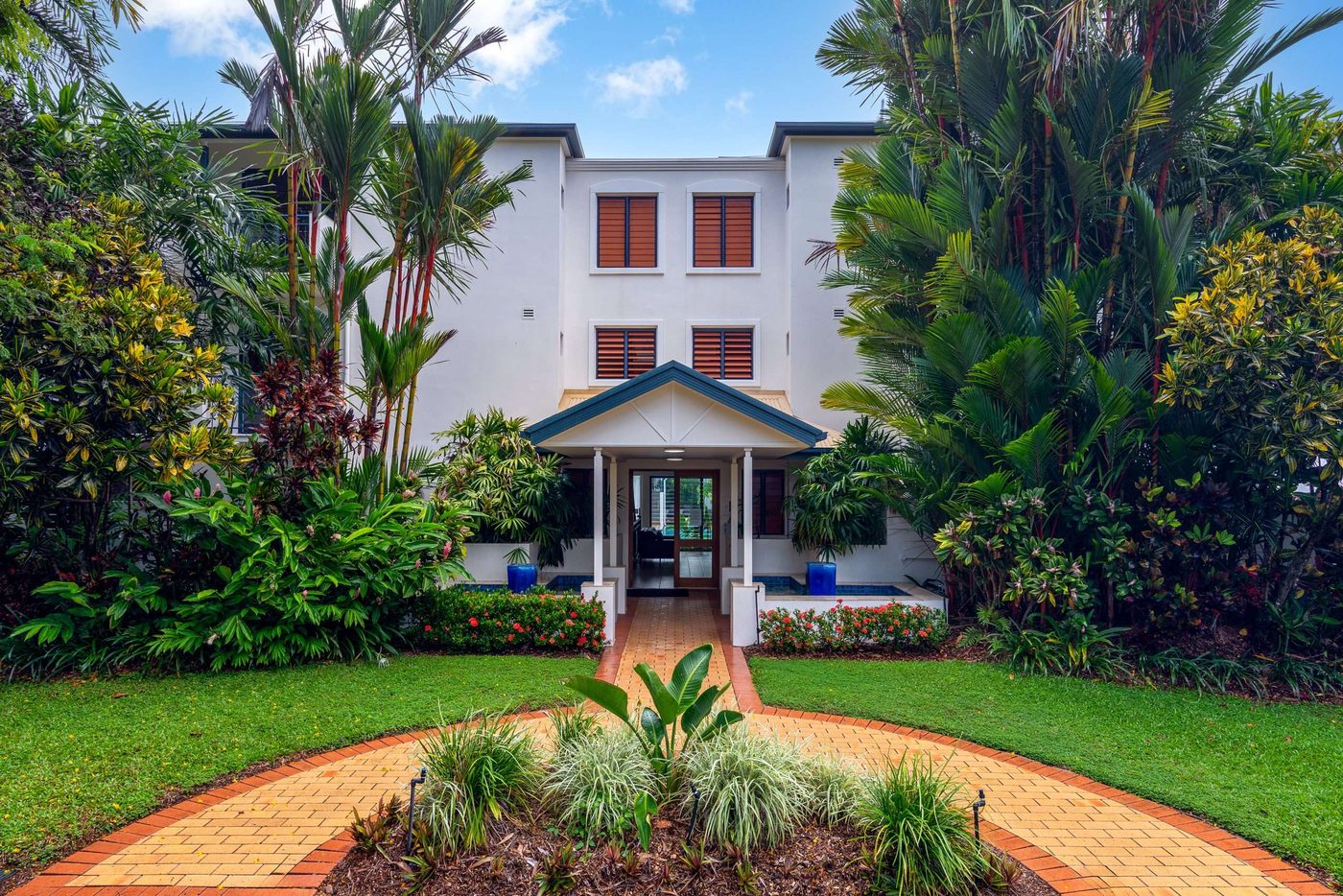 Meridian Port Douglas lagoon pool surrounded by lush tropical gardens